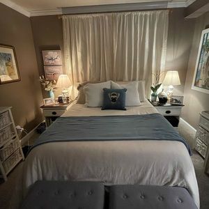 2 full length Beautiful curtain panels.